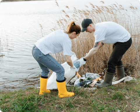 a woman and man packing dirt