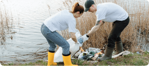 a woman with a man cleaning the environment